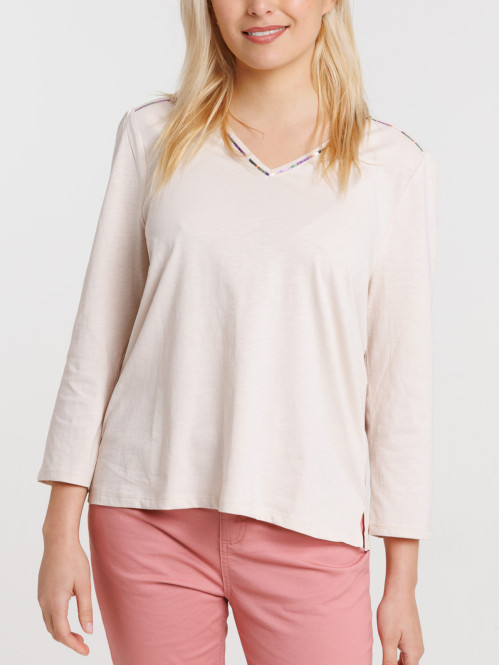 T-shirt col V crème grisée...