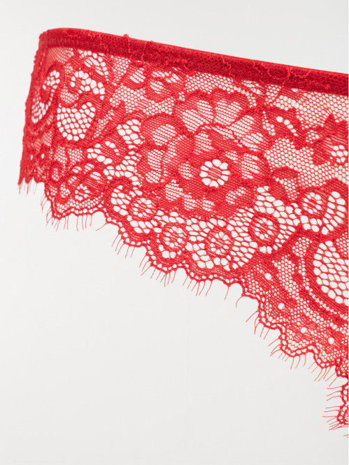 Tanga dentelle rouge femme...