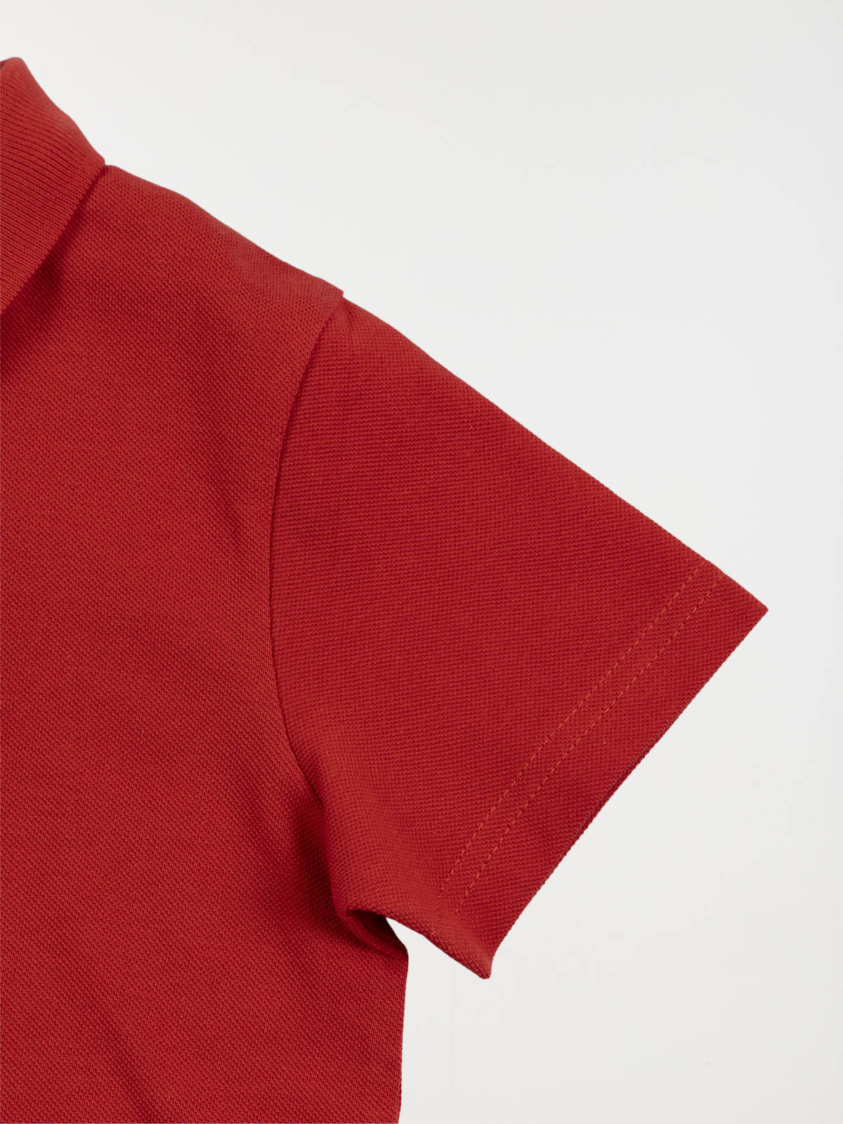 Polo uni rouge tomette garçon (3-12A)