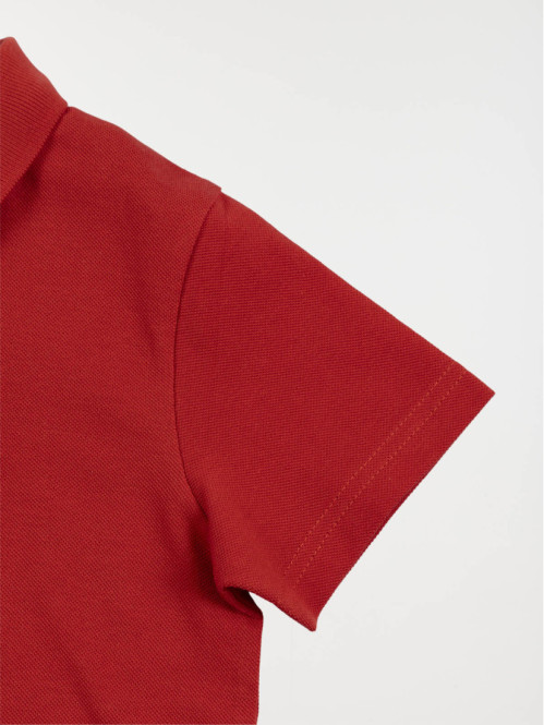 Polo uni rouge tomette...