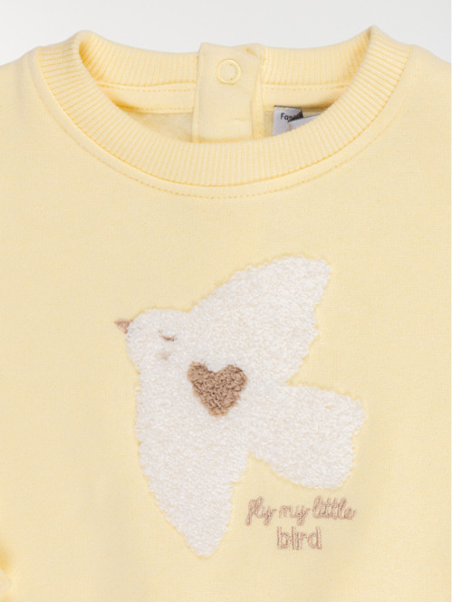 Sweat motif oiseau devant...