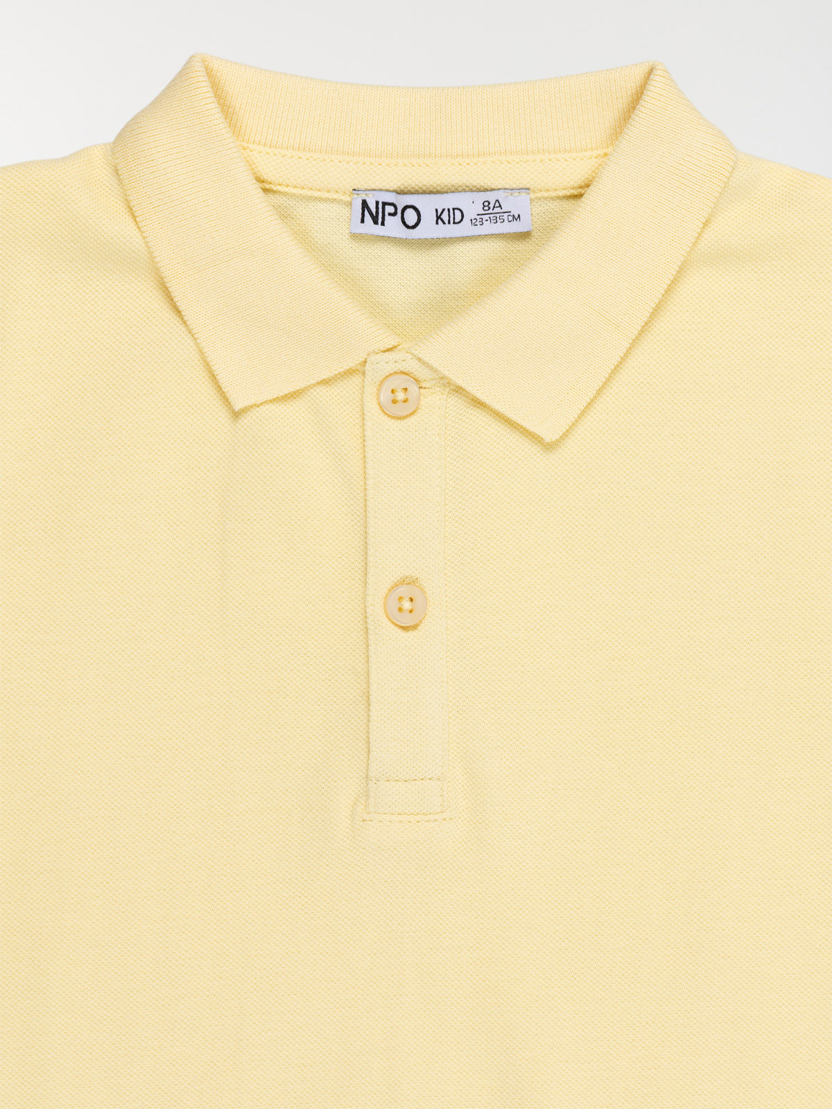 Polo uni jaune doux garçon (3-12A)
