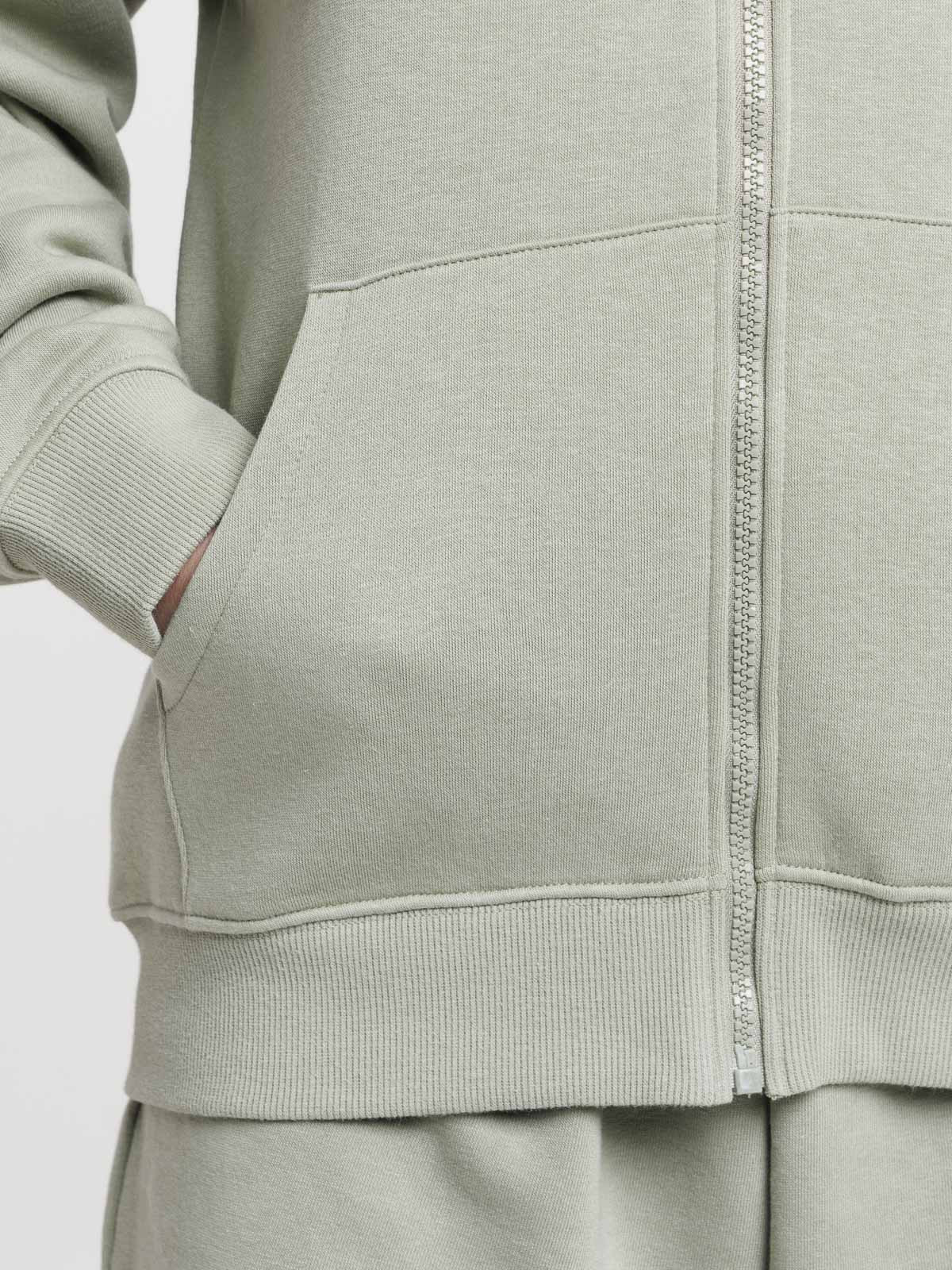 Sweat zippé capuche mousse clair femme