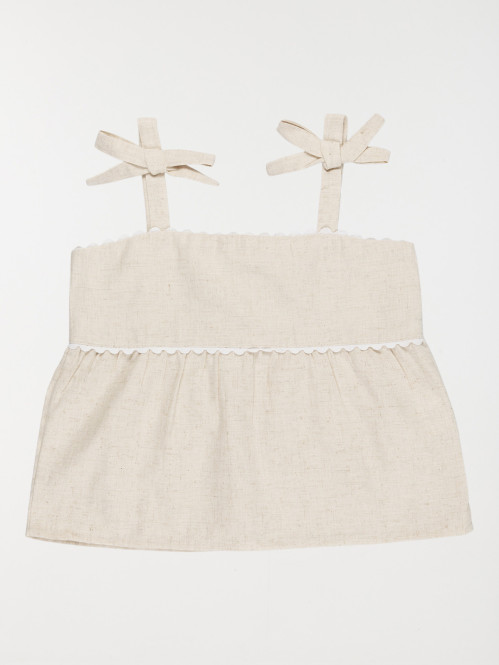 Blouse sans manches noeud...