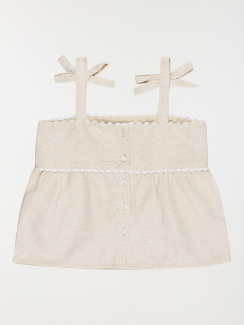 Blouse sans manches noeud...