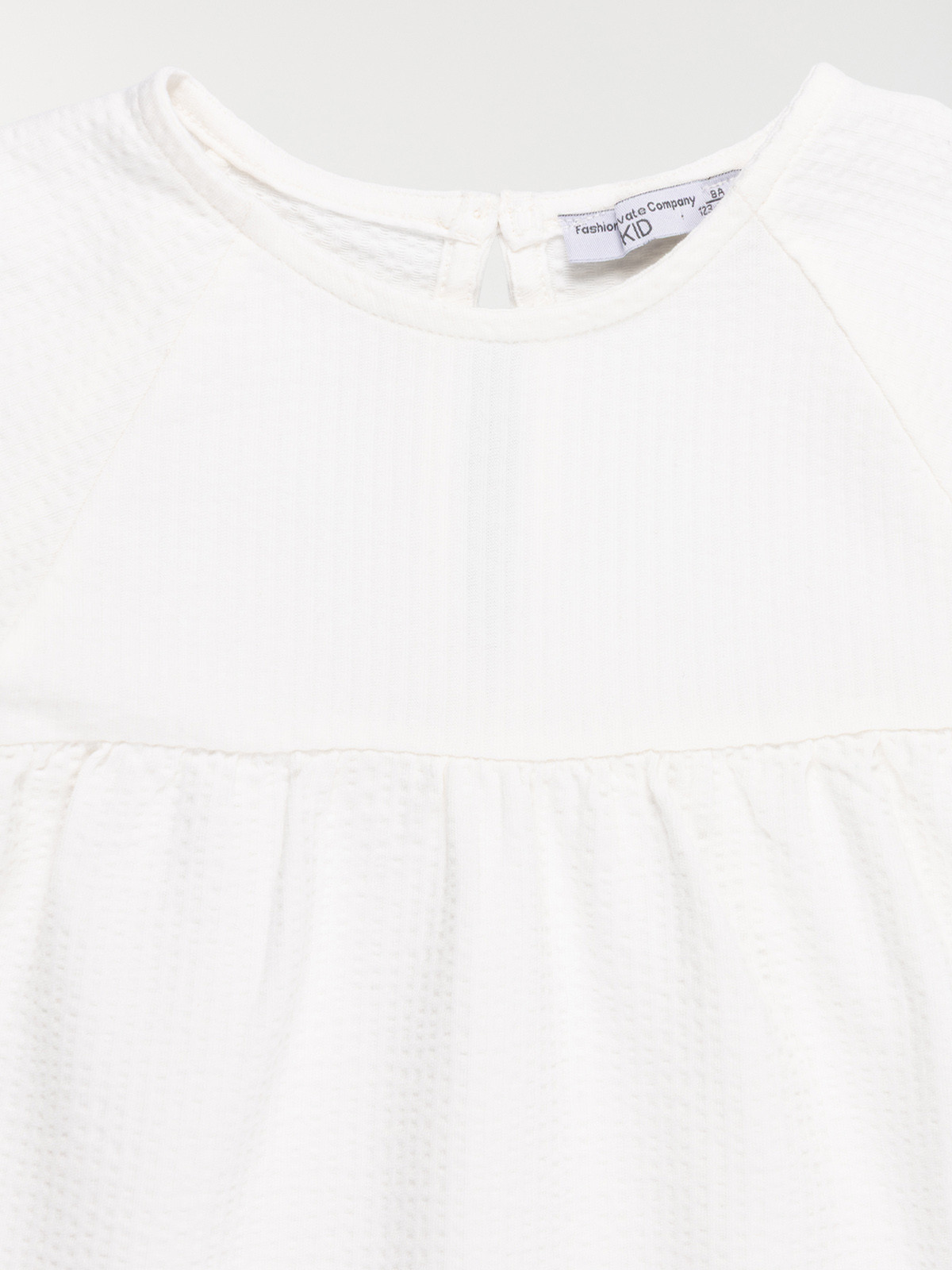 Tee-shirt écru bouton dos fille (3-12A)