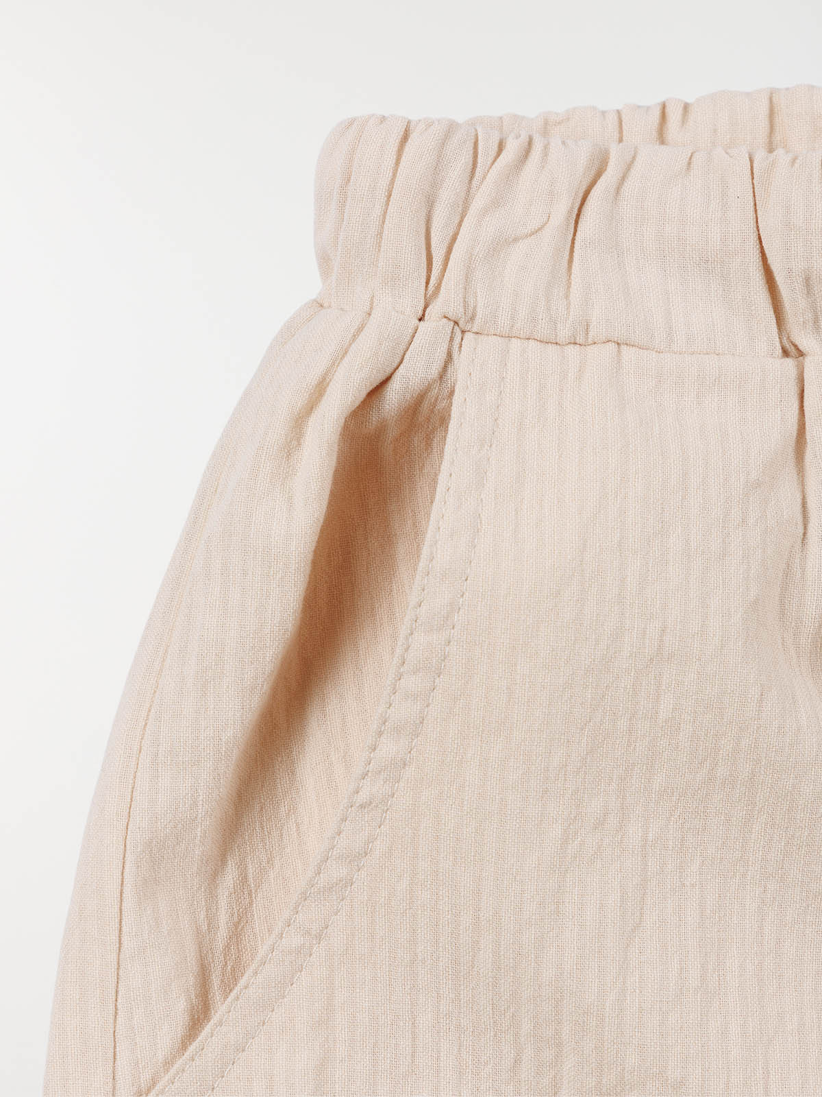 Pantalon large beige rosé fille (3-12A) Pantalon large beige rosé fille (3-12A)