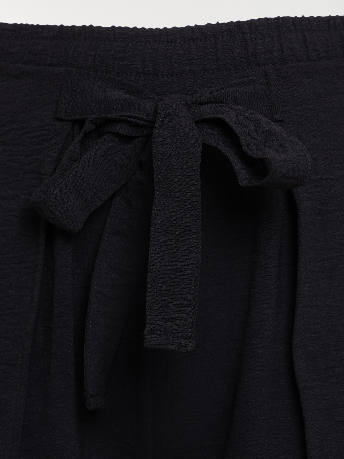 Pantalon noué noir grande taille femme