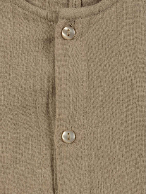 Combinaison boutonnée...