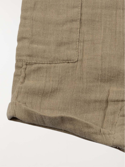 Combinaison boutonnée...