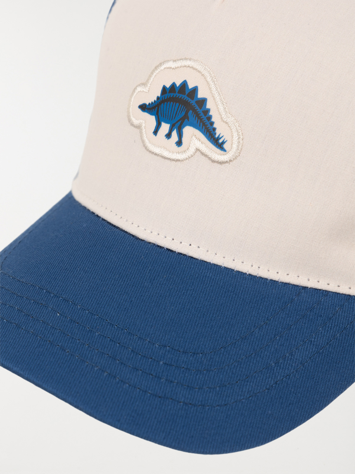 Casquette dinosaure bicolore garçon