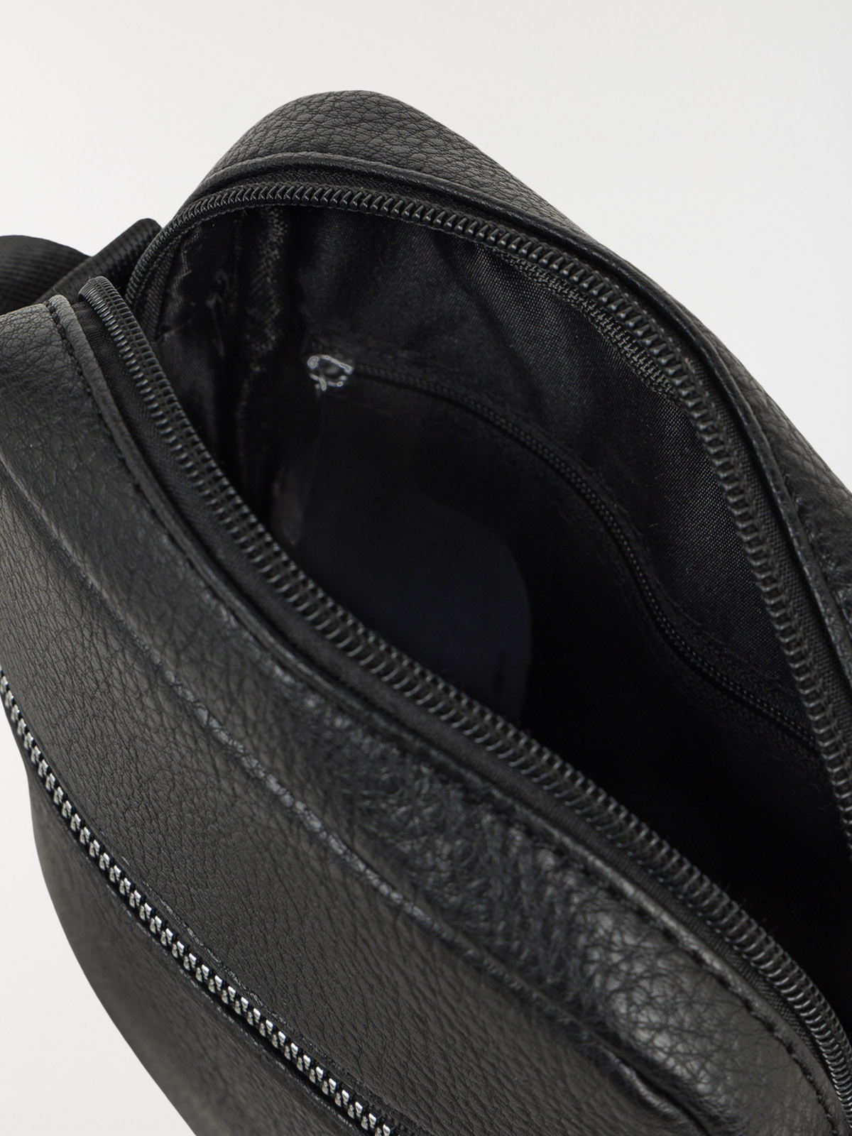 Pochette noire bandoulière homme