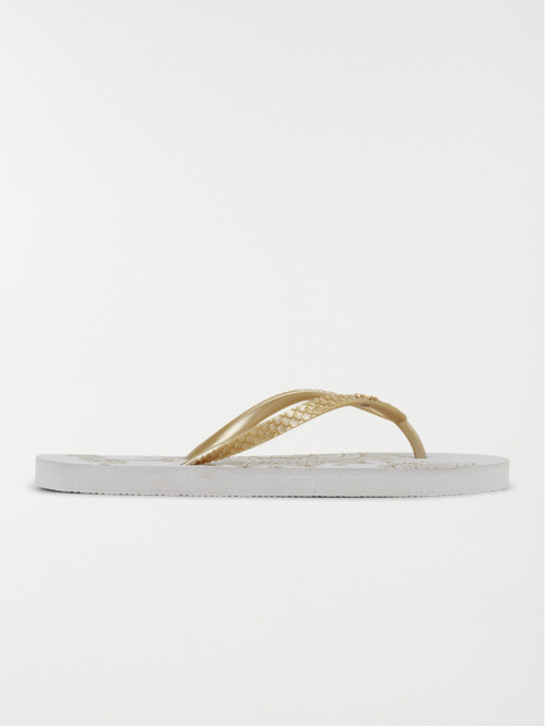 Tong motif éléphant doré...