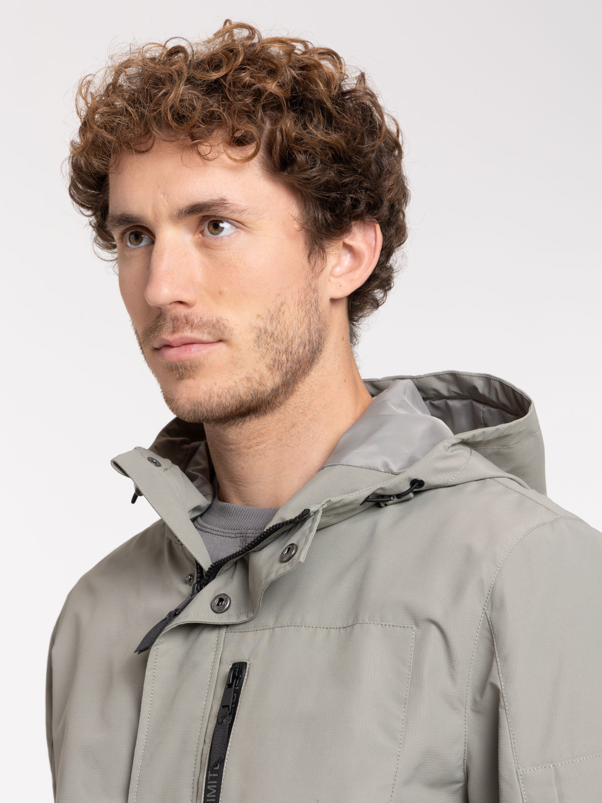 Blouson capuche multipoches homme