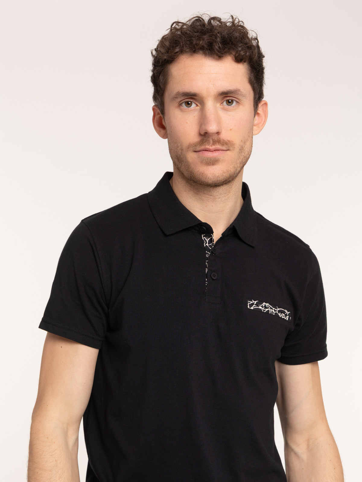 Polo coloris noir coton homme