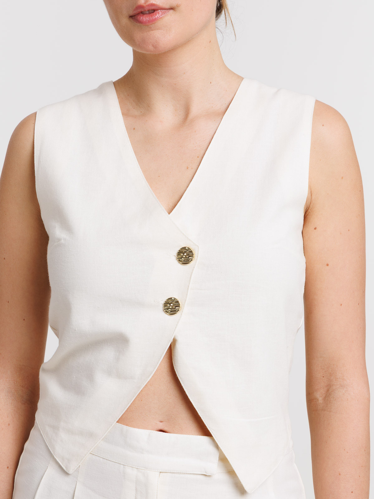 Gilet boutonné sans manches femme