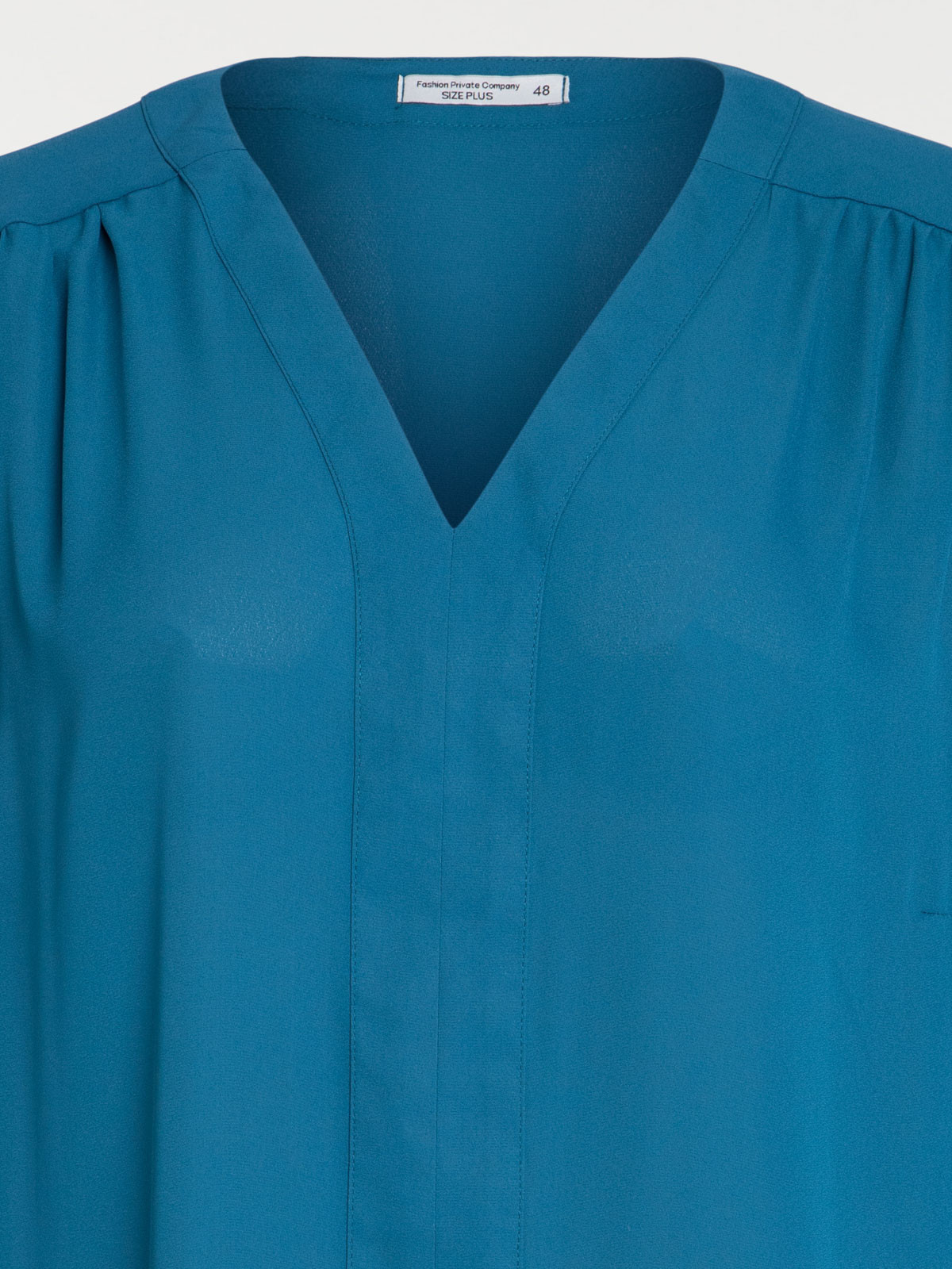 Blouse bleu paon grande taille femme