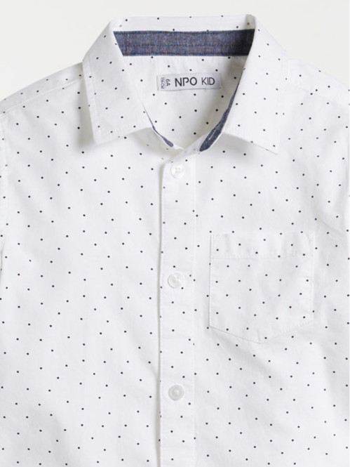 Chemise blanche à pois...