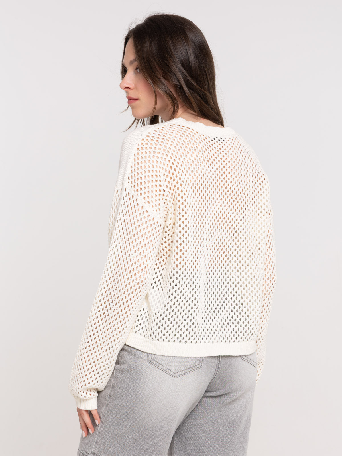 Pull ajouré motif soleil femme