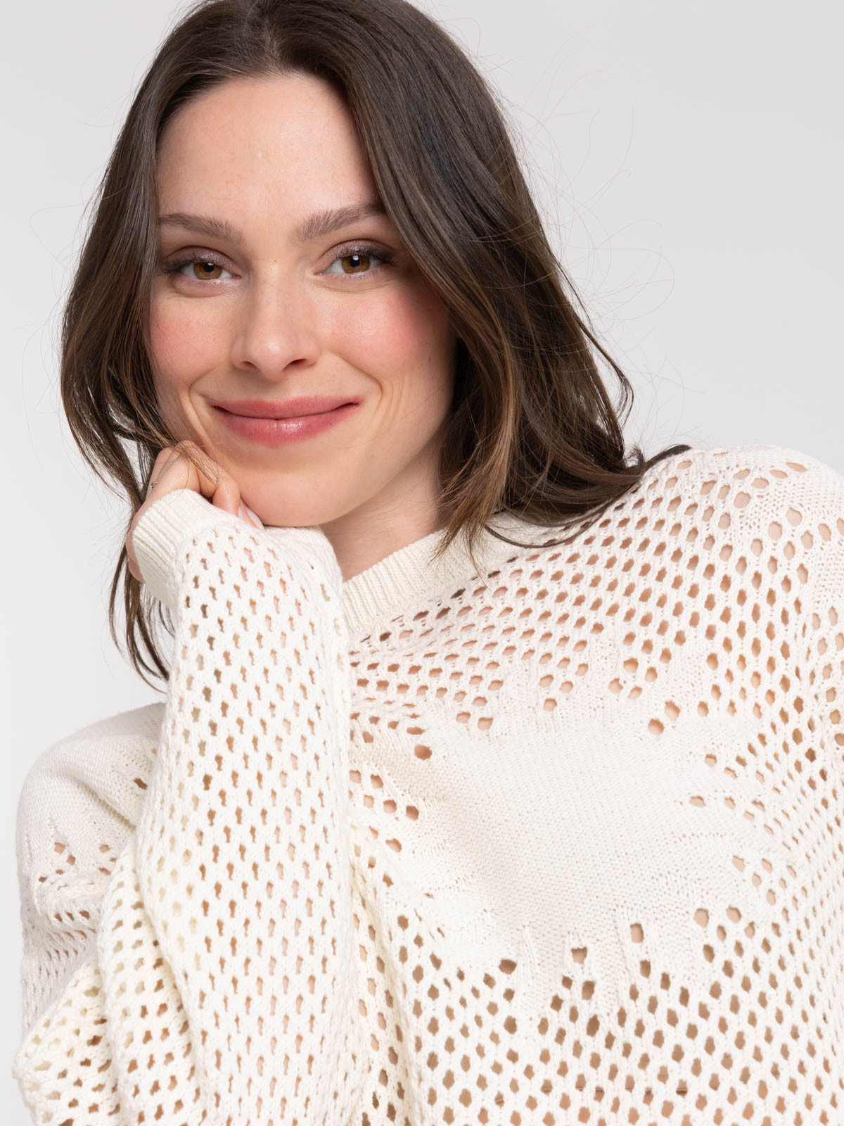 Pull ajouré motif soleil femme