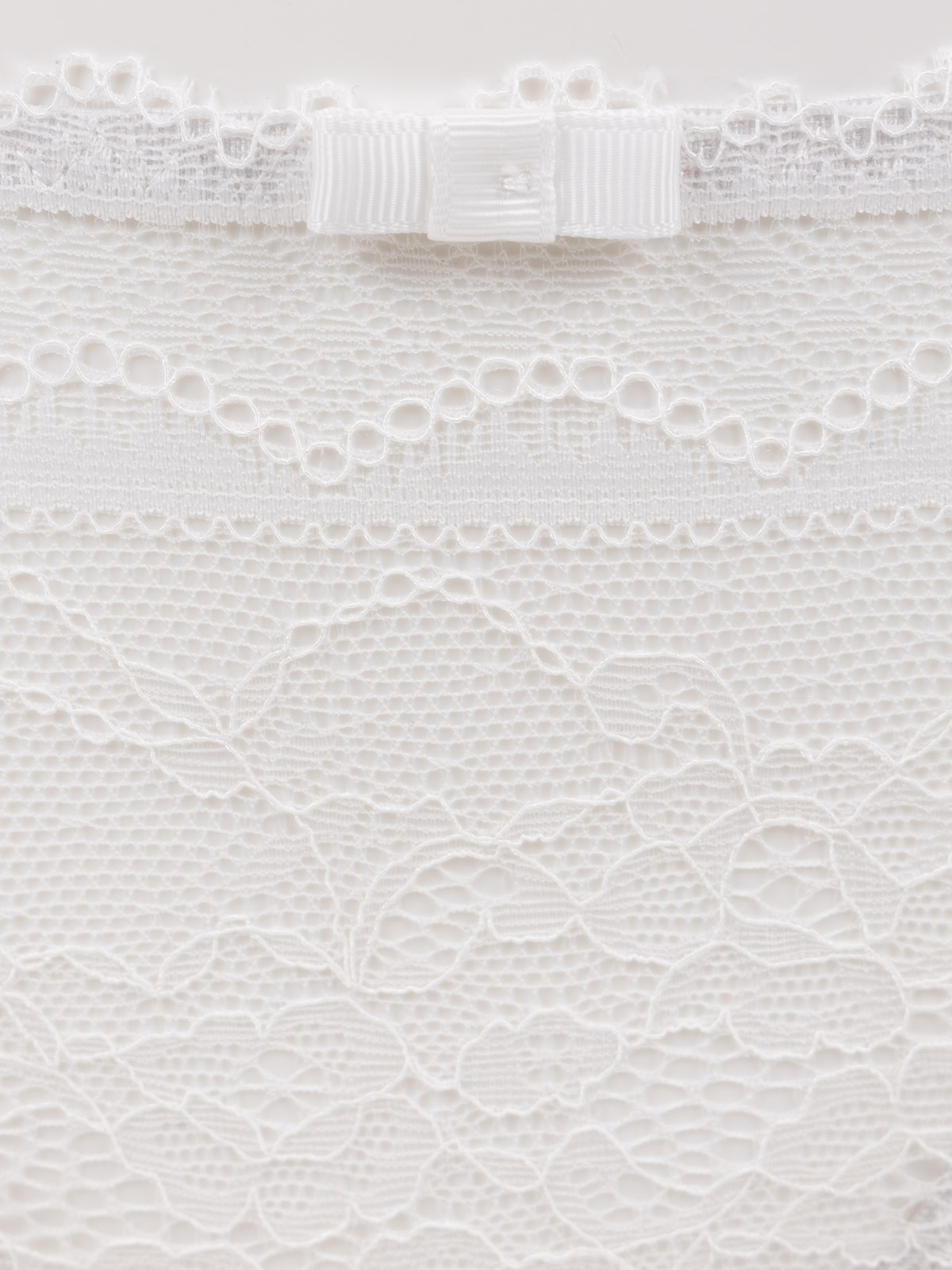 Tanga dentelle ivoire femme (34-46) Tanga dentelle ivoire femme (34-46)