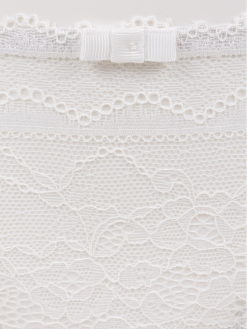 Tanga dentelle ivoire femme...