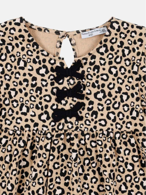 Blouse léopard avec nœuds...