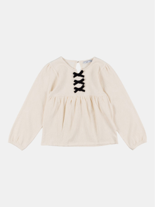 Blouse col rond avec nœuds...
