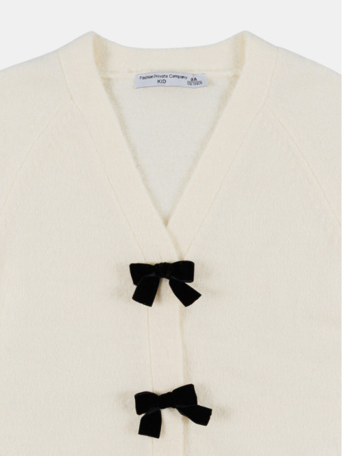 Gilet boutonné avec nœuds...