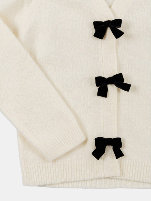 Gilet boutonné avec nœuds...