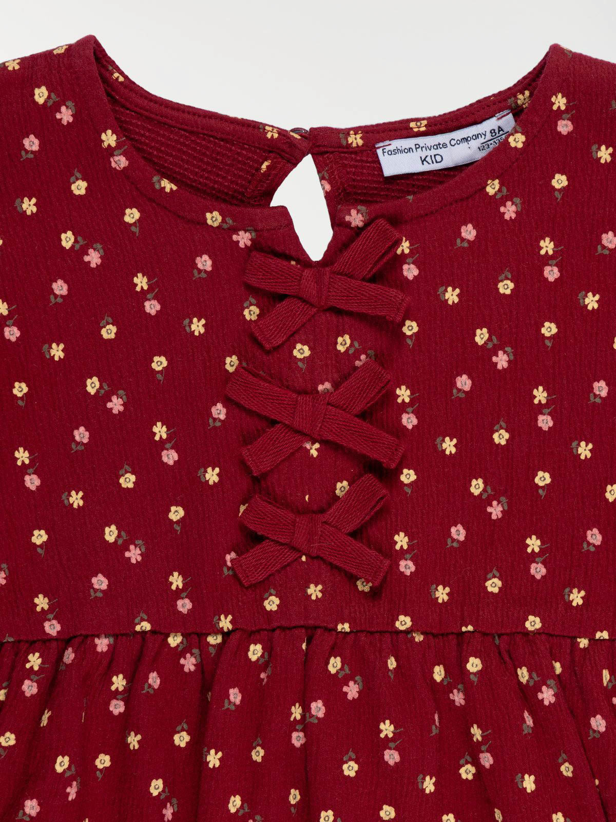 Blouse fleurie avec nœuds fille (3-12A) Blouse fleurie avec nœuds fille (3-12A)
