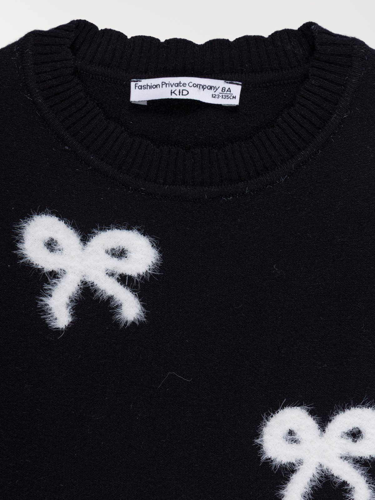Pull sans manches noeuds fille (3-12A) Pull sans manches noeuds fille (3-12A)