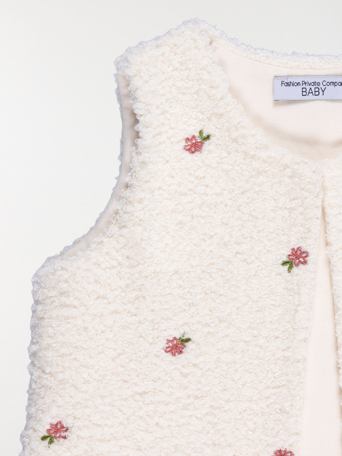 Gilet sherpa sans manches fille (3-36M) Gilet sherpa sans manches fille (3-36M)